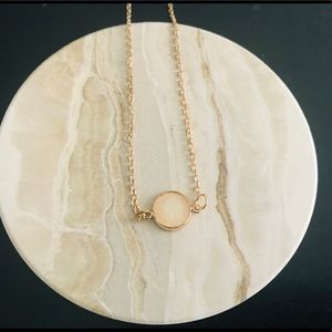 Gold tone shimmer pendant necklace